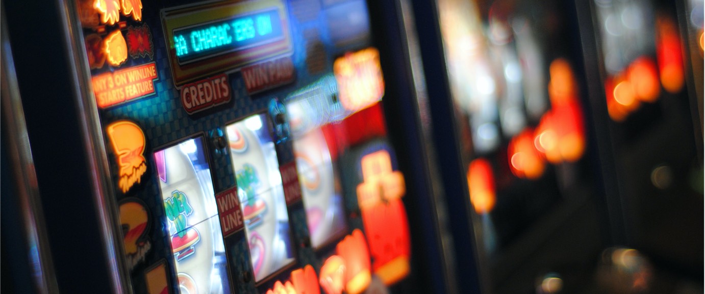 Close up image of a lit-up slot machine