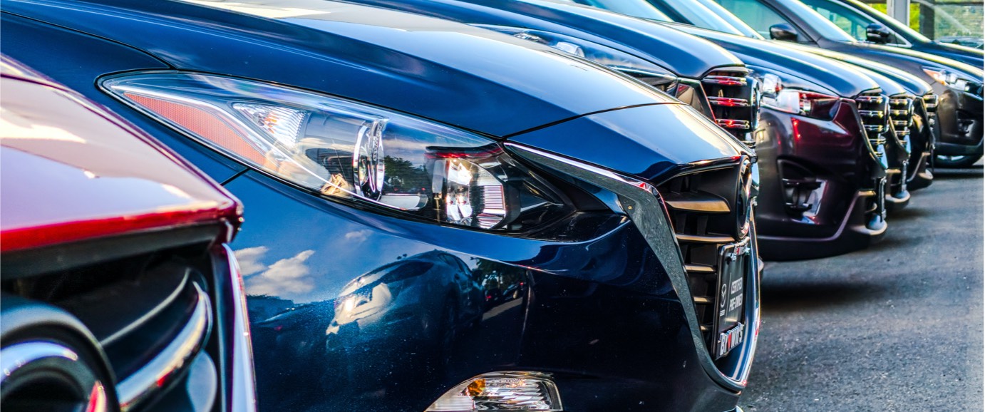 Close up image of cars parked in a parking lot
