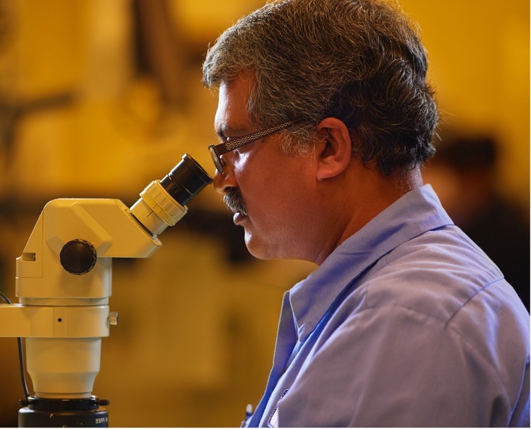 Photo of a man performing a Parts Inspection