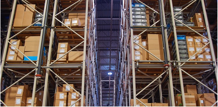 Boxes on large rows of shelving in the JST warehouse